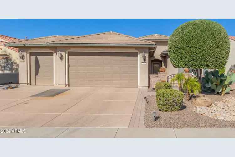 Buy 2 Bedroom 2 Bath Home with Den and Golf Cart Garage in a Desert Oasis