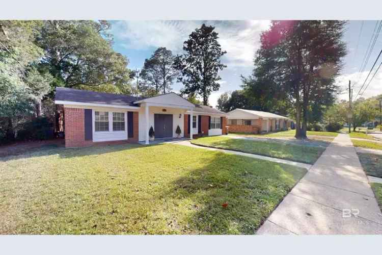 Buy Charming Brick Home Near University of South Alabama with Backyard Retreat