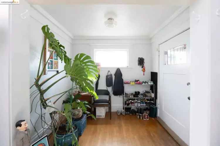 Buy Duplex in Oakland with Original Features and Charming Garden