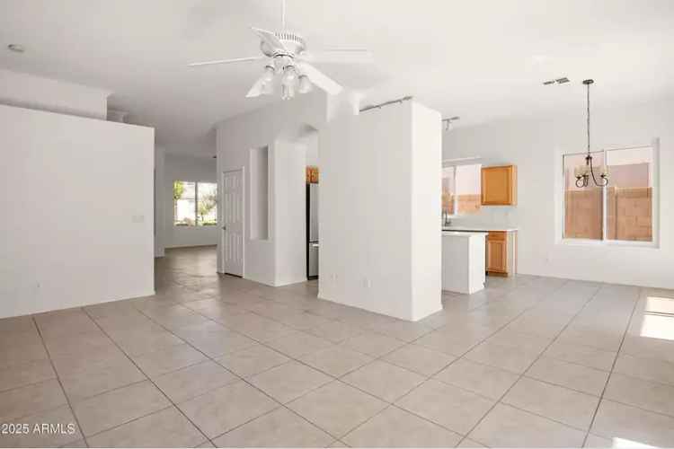 Buy 4 Bedroom Home with Garage in Chandler Featuring Spacious Living Areas and Garden