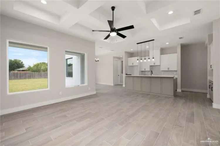 Buy home in Alamo TX featuring modern design and spacious layout