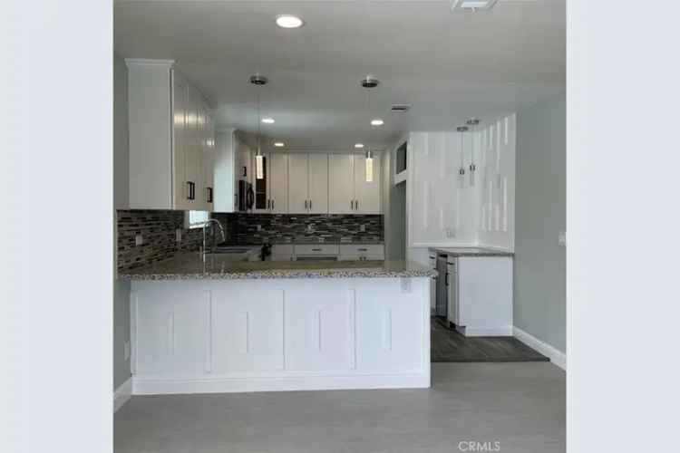 Buy Spacious Remodeled 4 Bedroom House with Bonus Unit Near Schools