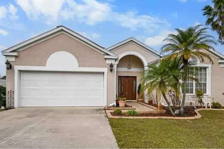 Buy Pool Home in Bradenton with Pond View and Outdoor Oasis