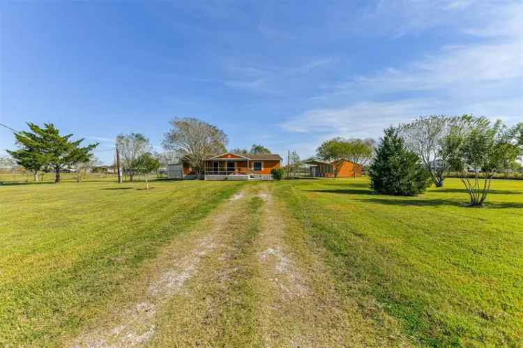 Buy Manufactured Home in Alvin with Pond and Workshop Space