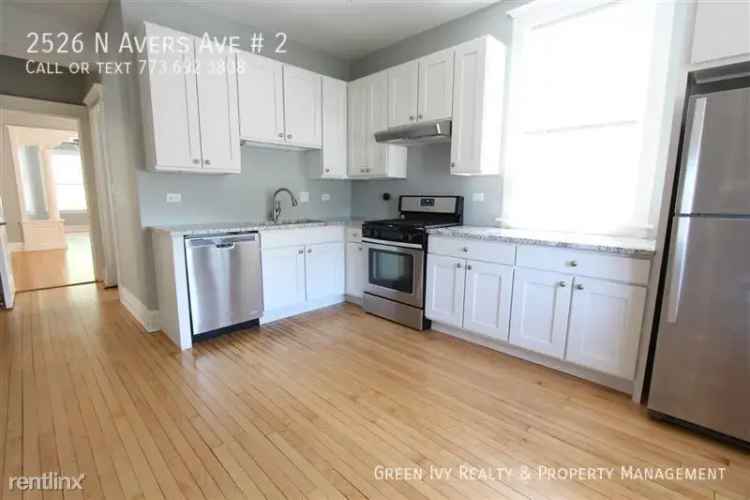 Rent Top Floor Apartment in Logan Square with Vintage Touches and Garage