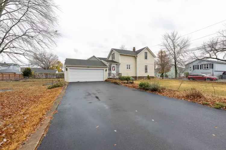 Buy Colonial Home with Great Potential in Fenced Corner Lot