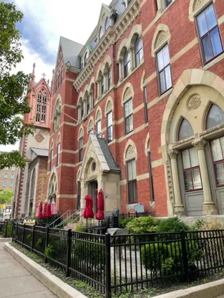 Rent Luxury Lofts in Historic Academy Building Downtown Rochester