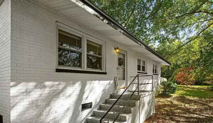 Rent Home Near Downtown with Private Backyard and Updated Interiors