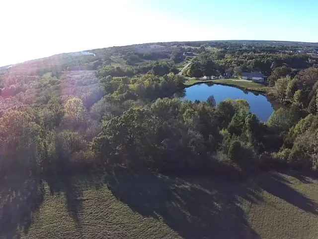 Buy Land in Waters Edge Ranch with Pond and Community Amenities