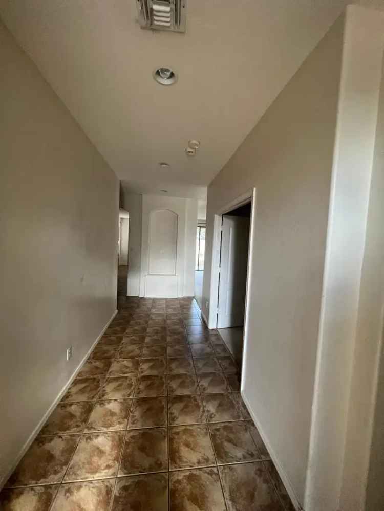 Rent 3 Bedroom 2 Bathroom Single Family Home in Gilbert with New Flooring