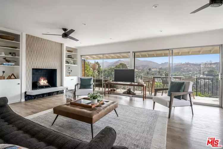 Buy mid-century home with skyline views in Beachwood Canyon