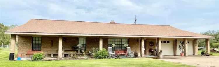 Country home for sale in Angleton with open floor plan and large yard