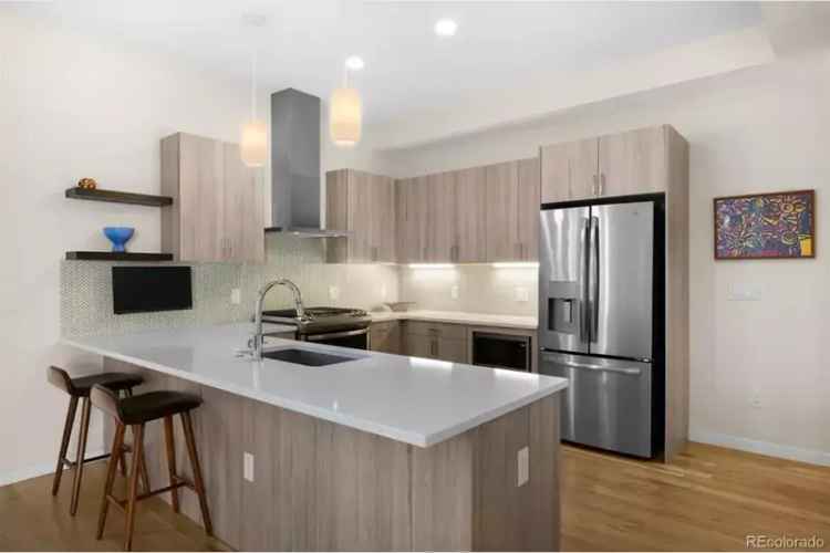 Buy Townhome in Sunnyside with Private Elevator and Modern Features