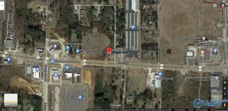 Commercial Land for Sale in Madison County with Prime Corner Lot Features