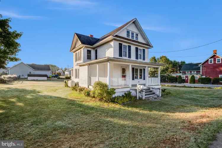 Buy Farmhouse in Milton with Classic Charm and Spacious Yard