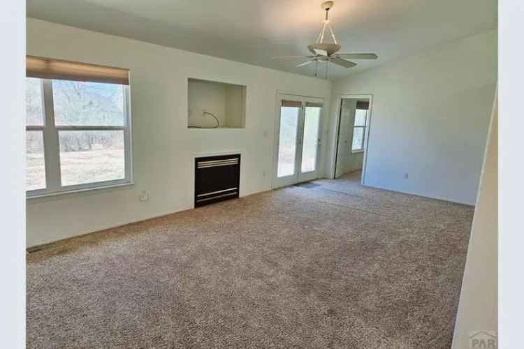 Buy Rancher in Pueblo West with 5 Bedrooms and Beautiful Golf Course Views