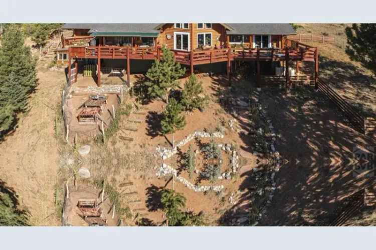 Custom Built Log Home for Sale with Stunning Views and Unique Features