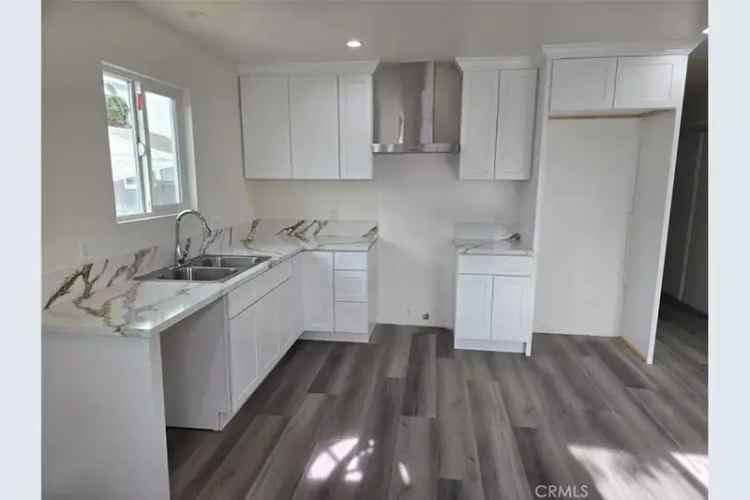 Investment Opportunity Triplex with Separate Units and Upgrades