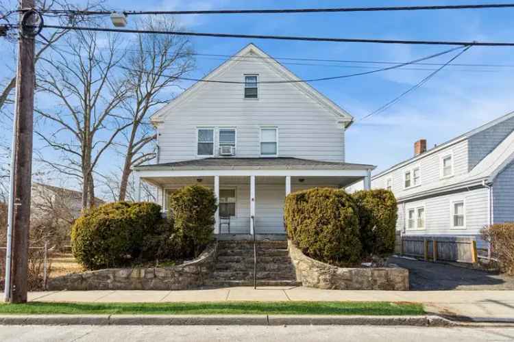 Invest in a Charming Two Family Home in Stamford with Potential