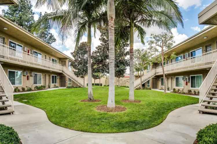 Rent Apartments in Anaheim Park Community with Garage and Green Space